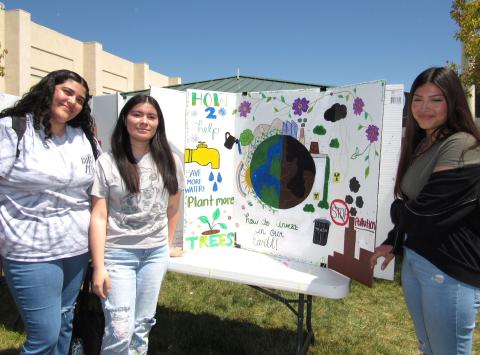 Noli Indian School students Sienna Goff, Bella Resvaloso, along with sophomore Jacklyn Ramirez show the poster they created and entered in the Earth Day poster contest Noli Indian School students Sienna Goff, Bella Resvaloso, along with sophomore Jacklyn Ramirez show the poster they created and entered in the Earth Day poster contest