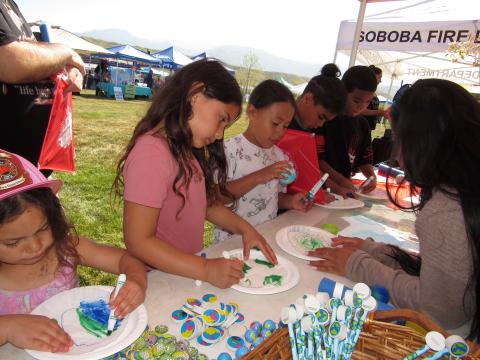 Earth-themed artwork is created by visitors to the Soboba Casino Resort’s booth at the Soboba Earth Day celebration Earth-themed artwork is created by visitors to the Soboba Casino Resort’s booth at the Soboba Earth Day celebration