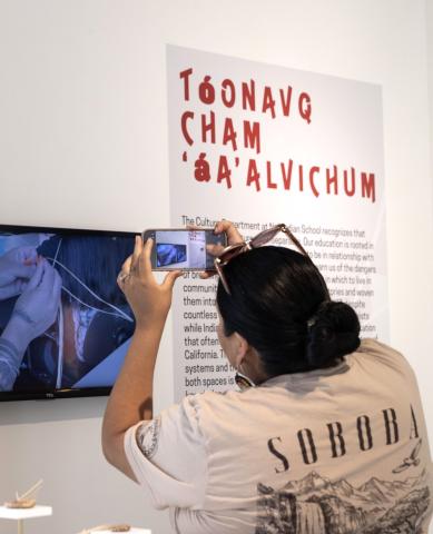 Soboba Tribal Member LeAndrea takes photos of a slideshow at The Robert and Frances Fullerton Museum of Art, May 21. Photo courtesy of CSUSB Soboba Tribal Member LeAndrea takes photos of a slideshow at The Robert and Frances Fullerton Museum of Art, May 21. Photo courtesy of CSUSB