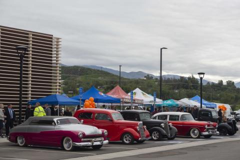 Classic cars added to the retro theme vibe of the grand opening celebration of Roadrunner Express as vendors shared their latest products that are featured at the convenience store Classic cars added to the retro theme vibe of the grand opening celebration of Roadrunner Express as vendors shared their latest products that are featured at the convenience store
