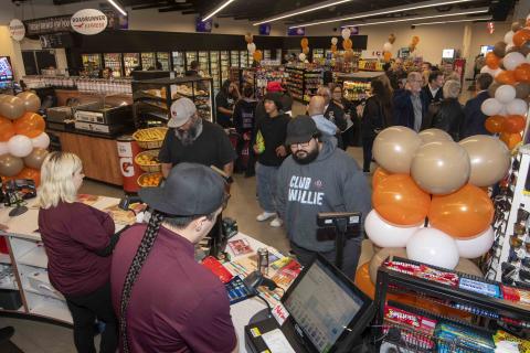 After the grand opening ceremony, guests shopped inside the Roadrunner Express convenience store After the grand opening ceremony, guests shopped inside the Roadrunner Express convenience store