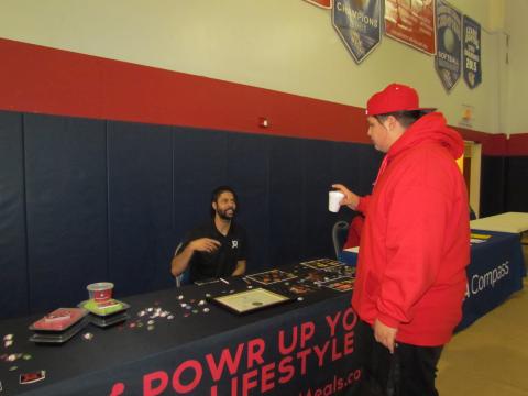 Courtney Crouch, left, discusses his healthy meal delivery program to Noli Indian School student Jerome Lugo, 13, at Soboba’s second annual Community Health Fair on March 7 Courtney Crouch, left, discusses his healthy meal delivery program to Noli Indian School student Jerome Lugo, 13, at Soboba’s second annual Community Health Fair on March 7