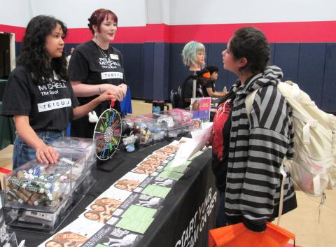 Meghan Pantaleon, left, and Tamera Condie from the Paul Mitchell school in Temecula, explain how they can help students interested in enrolling complete their FAFSA and other documents Meghan Pantaleon, left, and Tamera Condie from the Paul Mitchell school in Temecula, explain how they can help students interested in enrolling complete their FAFSA and other documents