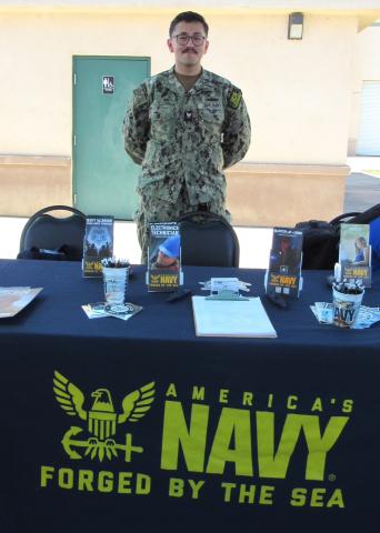 U.S. Navy recruiter Matthew Castellanos let students know about the variety of careers offered on land, sea and in the air U.S. Navy recruiter Matthew Castellanos let students know about the variety of careers offered on land, sea and in the air