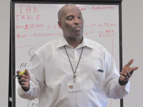 Soboba Tribal Administration’s Financial Analysis Manager Lenell Carter discussed taxes during the final class of the Financial Literacy 101 course he taught for young people at Soboba Soboba Tribal Administration’s Financial Analysis Manager Lenell Carter discussed taxes during the final class of the Financial Literacy 101 course he taught for young people at Soboba