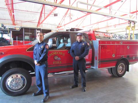 Firefighter Glenn Lindsey, left, and Fire Captain Jacob Briones stand beside the patrol truck recently acquired by the Soboba Fire Department Firefighter Glenn Lindsey, left, and Fire Captain Jacob Briones stand beside the patrol truck recently acquired by the Soboba Fire Department