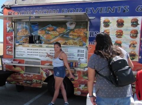Karen Vega describes menu items and takes orders at the San Diego Sliders food truck Karen Vega describes menu items and takes orders at the San Diego Sliders food truck