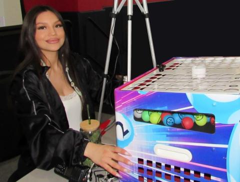 Loovi Herrera helps Bingo numbers caller Andrew Vallejos during the course of the two-hour Bingo Night Fundraiser at the Soboba Sports Complex Loovi Herrera helps Bingo numbers caller Andrew Vallejos during the course of the two-hour Bingo Night Fundraiser at the Soboba Sports Complex