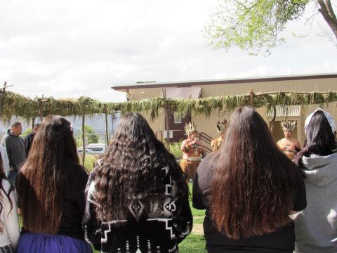 Raymond Basquez with the Pechanga Band of Indians, center, opens the 18th annual Gathering of the People surrounded by a circle of students, staff and community members at Noli Indian School on the Soboba Reservation, April 3 Raymond Basquez with the Pechanga Band of Indians, center, opens the 18th annual Gathering of the People surrounded by a circle of students, staff and community members at Noli Indian School on the Soboba Reservation, April 3