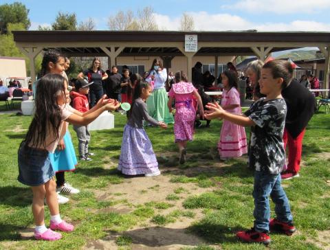 Young children take part in a water balloon toss at the 17th annual Gathering of the People, April 4 Young children take part in a water balloon toss at the 17th annual Gathering of the People, April 4