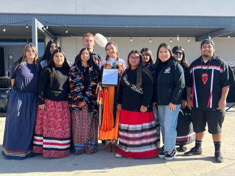 Vanessa Brierty, on behalf of Assemblymember James Ramos, presents members of the Four Directions club with a certificate of recognition at the third annual Gathering of the People at San Jacinto High School, Nov. 16. Courtesy photo by Rhonda Valenzuella Vanessa Brierty, on behalf of Assemblymember James Ramos, presents members of the Four Directions club with a certificate of recognition at the third annual Gathering of the People at San Jacinto High School, Nov. 16. Courtesy photo by Rhonda Valenzuella