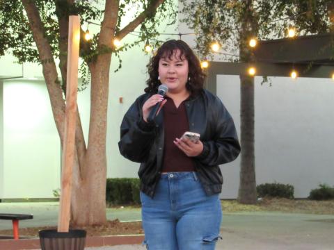 Emily Clarke shares some of her poetry with guests at the third annual Gathering of the People at San Jacinto High School Emily Clarke shares some of her poetry with guests at the third annual Gathering of the People at San Jacinto High School