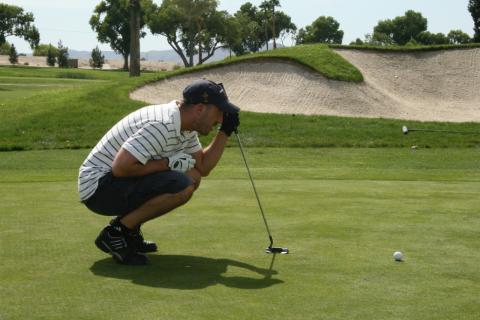 A golfer strategizes his next swing at The Country Club at Soboba Springs.**) VIDEO: (name of video clip here. Very important to get video for every story A golfer strategizes his next swing at The Country Club at Soboba Springs.**) VIDEO: (name of video clip here. Very important to get video for every story