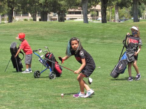 Inter Tribal Sports’ golf program spent the day at Soboba Springs Golf Course on April 17. At the first hole, Kali Valenzuela strategizes her shot while Soboba teammate Nataane Lopez, right, looks on. They were playing in the 5-7 age category Inter Tribal Sports’ golf program spent the day at Soboba Springs Golf Course on April 17. At the first hole, Kali Valenzuela strategizes her shot while Soboba teammate Nataane Lopez, right, looks on. They were playing in the 5-7 age category