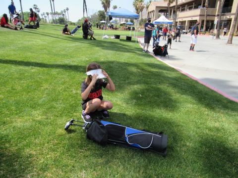 Nataane Lopez, 7, adjusts her visor before heading to the first hole to tee off at Soboba Springs Golf Course. A member of Team Soboba, she was one of about 20 youth who have been participating in the golf season for Inter Tribal Sports Nataane Lopez, 7, adjusts her visor before heading to the first hole to tee off at Soboba Springs Golf Course. A member of Team Soboba, she was one of about 20 youth who have been participating in the golf season for Inter Tribal Sports