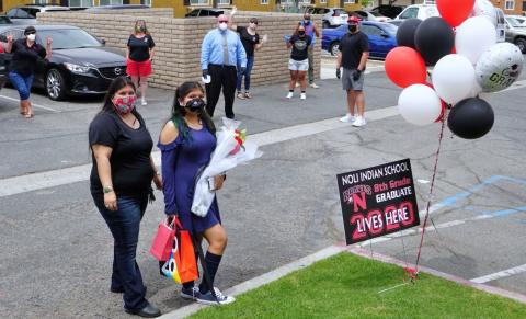 Noli Indian School staff visited eighth-grader Maritza Zaragoza-Castellano in person to present her with a certificate, a yard sign, a memorabilia bag and more to commemorate her promotion to high school on June 2  Noli Indian School staff visited eighth-grader Maritza Zaragoza-Castellano in person to present her with a certificate, a yard sign, a memorabilia bag and more to commemorate her promotion to high school on June 2