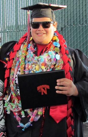Noli Indian School Class of 2017 graduate Raymond Barsz proudly shows his diploma to friends and family after commencement on June 7 Noli Indian School Class of 2017 graduate Raymond Barsz proudly shows his diploma to friends and family after commencement on June 7