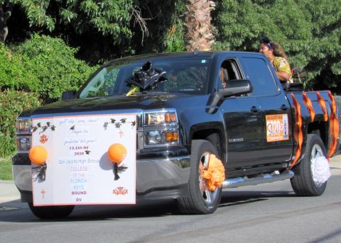 Shayna Silvas-Thomas, a third generation San Jacinto High School graduate, waves to cheerleaders from the back of her mom’s truck during the Student Recognition Parade on June 26 Shayna Silvas-Thomas, a third generation San Jacinto High School graduate, waves to cheerleaders from the back of her mom’s truck during the Student Recognition Parade on June 26