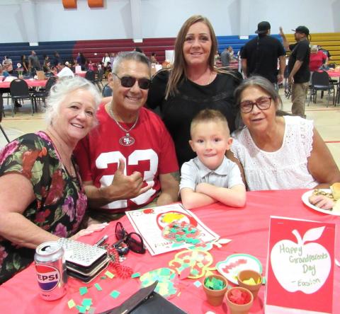Pre-K student Easton Lewis is happy to spend the morning with his family. From left, grandmother Tara Soto, grandfather Nicolas Soto, nana Heather Baeza, and great-grandmother Margaret Swan Pre-K student Easton Lewis is happy to spend the morning with his family. From left, grandmother Tara Soto, grandfather Nicolas Soto, nana Heather Baeza, and great-grandmother Margaret Swan