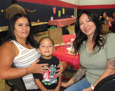 Three-year-old Tukaamawish “Dada” Briones celebrated both his grandmothers Tracy Briones, left, and Patty Coronado at the Soboba Tribal Preschool event Three-year-old Tukaamawish “Dada” Briones celebrated both his grandmothers Tracy Briones, left, and Patty Coronado at the Soboba Tribal Preschool event