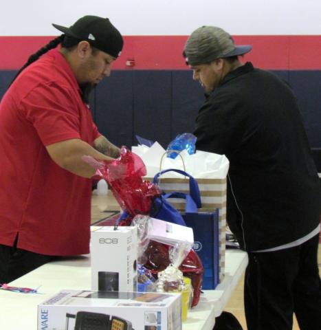 Steve Lopez, left, helps fair coordinator Ricardo Macias prepare prizes for guests at Soboba’s Community Health Fair. Lopez was the men’s weight-loss challenge winner for losing 28.2 pounds Steve Lopez, left, helps fair coordinator Ricardo Macias prepare prizes for guests at Soboba’s Community Health Fair. Lopez was the men’s weight-loss challenge winner for losing 28.2 pounds