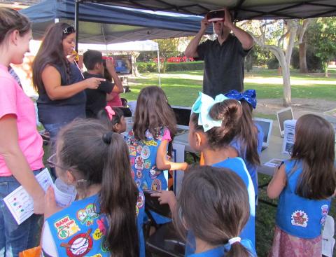 David Sheiner, San Jacinto Unified School District Education Technician, shares virtual reality headsets with members of Girl Scout Troop 500 during the San Jacinto Heritage Festival David Sheiner, San Jacinto Unified School District Education Technician, shares virtual reality headsets with members of Girl Scout Troop 500 during the San Jacinto Heritage Festival