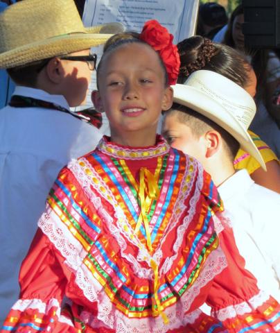 Mikaela Martin, 8, was one of the dancers from Megan Cope Elementary’s Dual Immersion Program that performed at the San Jacinto Heritage Festival. Her colorful dress was brought from Guatemala by her grandmother Mikaela Martin, 8, was one of the dancers from Megan Cope Elementary’s Dual Immersion Program that performed at the San Jacinto Heritage Festival. Her colorful dress was brought from Guatemala by her grandmother