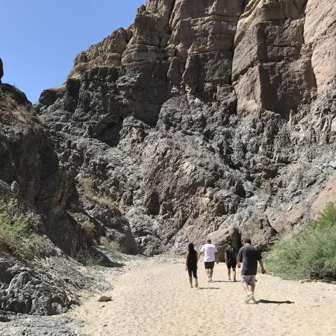 Hikers enjoy the rock formations during a walk through Mecca Hills Painted Canyon/Ladder Canyon in Desert Hot Springs on April 15 Hikers enjoy the rock formations during a walk through Mecca Hills Painted Canyon/Ladder Canyon in Desert Hot Springs on April 15