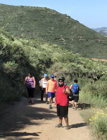 Potato Chip Rock was one of several trails on the Spring Hike Series organized by Steve Lopez through the Soboba Parks and Recreation Department. Mike Nevarez, in front, gives a thumbs-up while waiting for his wife, Regina, at left with walking stick, to catch up Potato Chip Rock was one of several trails on the Spring Hike Series organized by Steve Lopez through the Soboba Parks and Recreation Department. Mike Nevarez, in front, gives a thumbs-up while waiting for his wife, Regina, at left with walking stick, to catch up