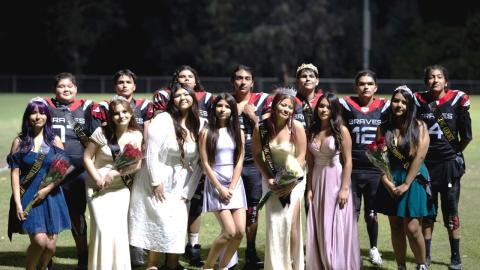 The Homecoming Court poses on centerfield during halftime. Noli Yearbook Staff photo The Homecoming Court poses on centerfield during halftime. Noli Yearbook Staff photo
