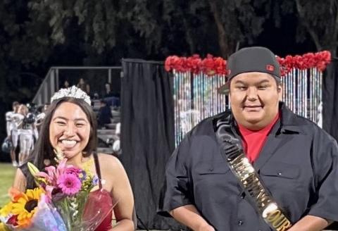 Sophomore Class Duchess Davina Magante and Sophomore Class Duke Babe Briones take the football field during halftime Sophomore Class Duchess Davina Magante and Sophomore Class Duke Babe Briones take the football field during halftime