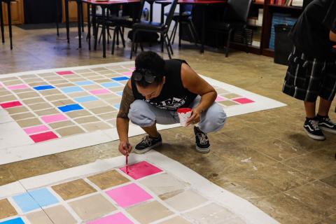 Scrabble pieces are painted in the days leading up to the Homecoming float parade on Oct. 19 Scrabble pieces are painted in the days leading up to the Homecoming float parade on Oct. 19