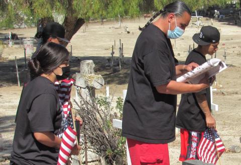 Soboba Parks and Recreation Director Andy Silvas, who is also co-coordinator for the Soboba Youth Council, uses an aerial map of the Soboba Cemetery to locate veterans’ gravesites for flag placing on May 28 Soboba Parks and Recreation Director Andy Silvas, who is also co-coordinator for the Soboba Youth Council, uses an aerial map of the Soboba Cemetery to locate veterans’ gravesites for flag placing on May 28
