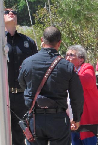 U.S. Women’s Air Force veteran Theresa Seaton is assisted by Soboba Firefighters in raising the American flag during a Memorial Day ceremony at Soboba Cemetery on May 31 U.S. Women’s Air Force veteran Theresa Seaton is assisted by Soboba Firefighters in raising the American flag during a Memorial Day ceremony at Soboba Cemetery on May 31