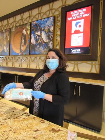 Michelle Woodfin from Soboba Casino Resort hotel services shows one of the wellness kits containing hand sanitizer and face masks that each guest receives upon check-in Michelle Woodfin from Soboba Casino Resort hotel services shows one of the wellness kits containing hand sanitizer and face masks that each guest receives upon check-in