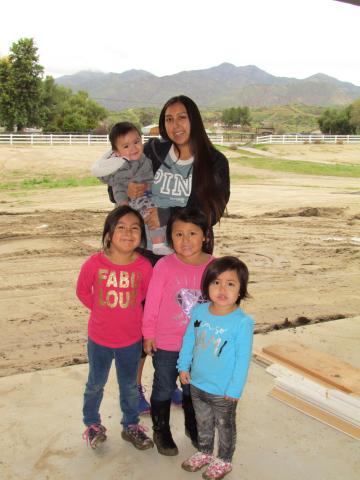 Nicole Diaz and her children stand in the three-car garage of their new home under construction on the Soboba Reservation Nicole Diaz and her children stand in the three-car garage of their new home under construction on the Soboba Reservation