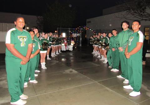 Members of the Tahquitz High School competition cheer team wait to assist with transporting 1,000 Soboba Gives Back! Toy Drive toys from the Soboba bus to a storage unit at the high school campus in Hemet Members of the Tahquitz High School competition cheer team wait to assist with transporting 1,000 Soboba Gives Back! Toy Drive toys from the Soboba bus to a storage unit at the high school campus in Hemet