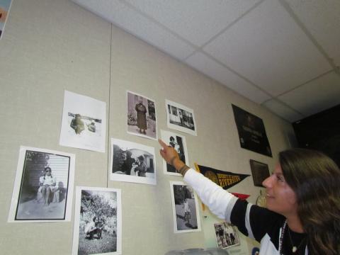 Noli Indian School teacher Tashina Ornelas keeps photos that depict her family's history on the classroom wall where she teaches Native history, literature and culture classes. The photos include those of her grandmother Barbara Jean Candelaria, great-grandmother Dorothy Miranda and great-grandfather Eugene Candelaria , great-great-grandmother Catalina "Cate" Lisalda and great-great-grandfather Andrew Miranda and the matriarch of her family, her great-great-great-grandmother Manuella "Nellie" Miranda from the Pechanga Indian Reservation.  Ornelas points to the photo of "Nellie" as she explains she was a midwife who help deliver many babies at the Soboba reservation during the late 1800s Noli Indian School teacher Tashina Ornelas keeps photos that depict her family's history on the classroom wall where she teaches Native history, literature and culture classes
