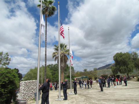 Members of the Soboba Fire Department raised flags during the Memorial Day recognition ceremony at Soboba Cemetery on May 27 Members of the Soboba Fire Department raised flags during the Memorial Day recognition ceremony at Soboba Cemetery on May 27