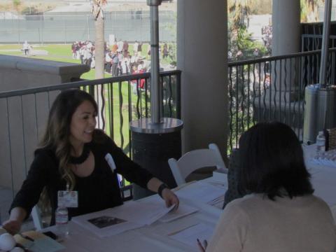 Ana Alcaraz, left, congratulates Shiseida Duro on receiving an offer of employment at the Soboba Casino Resort Job Fair while other potential employees wait in line on Nov. 26 Ana Alcaraz, left, congratulates Shiseida Duro on receiving an offer of employment at the Soboba Casino Resort Job Fair while other potential employees wait in line on Nov. 26