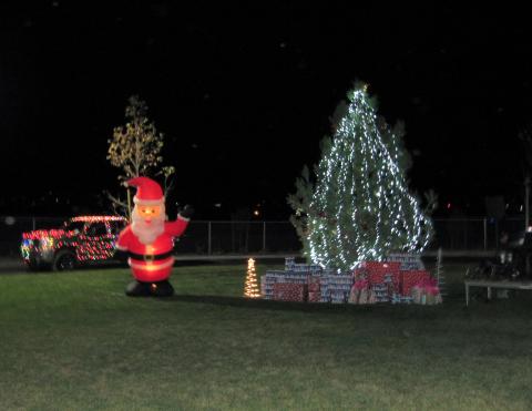 Some of the Light Parade participants kept their cars lit as the decorated pine tree at the Soboba Sports Complex was lit during a ceremony on Dec. 19 Some of the Light Parade participants kept their cars lit as the decorated pine tree at the Soboba Sports Complex was lit during a ceremony on Dec. 19
