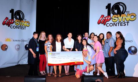Members of the Soboba Foundation, at right, congratulate the Ramona Bowl with a big check for their first-place win at the 10th annual Lip Sync Contest on June 23. A dozen nonprofits performed and earned money for their causes Members of the Soboba Foundation, at right, congratulate the Ramona Bowl with a big check for their first-place win at the 10th annual Lip Sync Contest on June 23. A dozen nonprofits performed and earned money for their causes