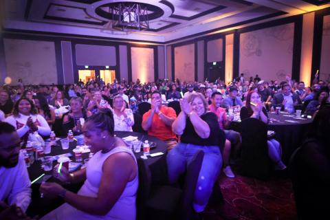 The sold-out audience reacts with glow sticks and applause to the performance by American Cancer Society-Relay for Life’s boy band performers The sold-out audience reacts with glow sticks and applause to the performance by American Cancer Society-Relay for Life’s boy band performers