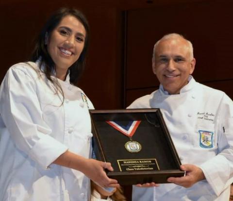 Graduate Nanisha Ramos is congratulated by Chef David Avalos for being Riverside City College Culinary Academy’s class valedictorian on April 12 Graduate Nanisha Ramos is congratulated by Chef David Avalos for being Riverside City College Culinary Academy’s class valedictorian on April 12