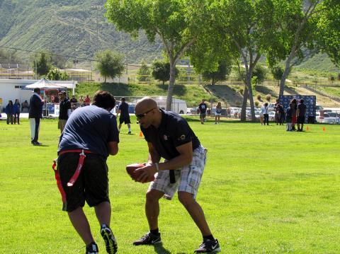 Rams alumnus Robert Delpino works with Native American youth during an NFL Play Football skills clinic at Soboba on April 1 Rams alumnus Robert Delpino works with Native American youth during an NFL Play Football skills clinic at Soboba on April 1
