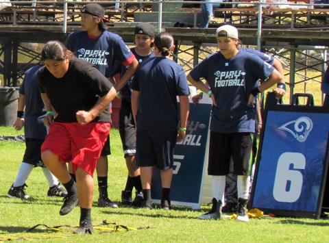 Edwin Muro, 13, works on agility and footwork during an NFL Play Football skills drill at Soboba on Saturday Edwin Muro, 13, works on agility and footwork during an NFL Play Football skills drill at Soboba on Saturday