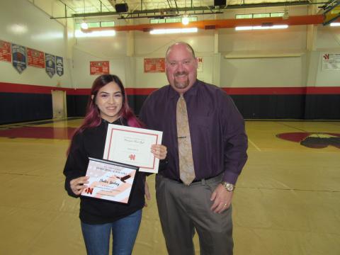 Noli Indian School Principal Donovan Post congratulates senior Bailee Lindsey for earning a 4.0 GPA, which put her on the Principal’s Honor Roll. Noli Indian School Principal Donovan Post congratulates senior Bailee Lindsey for earning a 4.0 GPA, which put her on the Principal’s Honor Roll.