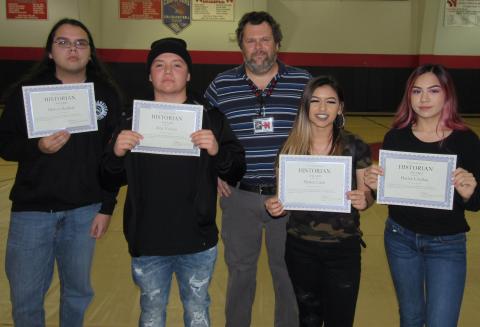 Noli Indian School’s high school history teacher Michael Plemons awarded a “Historian” designation to four of his students that he said not only demonstrated the 3Rs in his classroom but were also A students. From left, Melvin Herbert, Alex Vallejo, Plemons, Shalea Luna and Bailee Lindsey. Noli Indian School’s high school history teacher Michael Plemons awarded a “Historian” designation to four of his students that he said not only demonstrated the 3Rs in his classroom but were also A students. From left, Melvin Herbert, Alex Vallejo, Plemons, Shalea Luna and Bailee Lindsey.