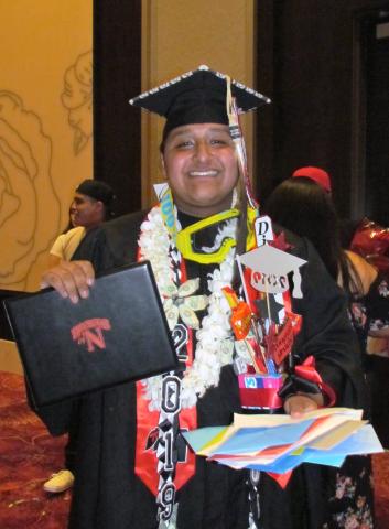 Noli Indian School graduate Delbert Briones was all smiles after receiving his diploma and lots of well wishes and gifts from family and friends who attended the ceremony at the Soboba Casino Resort Event Center on June 5 Noli Indian School graduate Delbert Briones was all smiles after receiving his diploma and lots of well wishes and gifts from family and friends who attended the ceremony at the Soboba Casino Resort Event Center on June 5