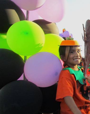 Soboba Tribal Preschool kindergartner, Paa’ayat Arviso, 5, wears a pumpkin hat he painted while riding a float with his classmates as part of the Noli Indian School Homecoming Parade on Oct. 26 Soboba Tribal Preschool kindergartner, Paa’ayat Arviso, 5, wears a pumpkin hat he painted while riding a float with his classmates as part of the Noli Indian School Homecoming Parade on Oct. 26